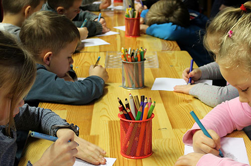 Children writing at school